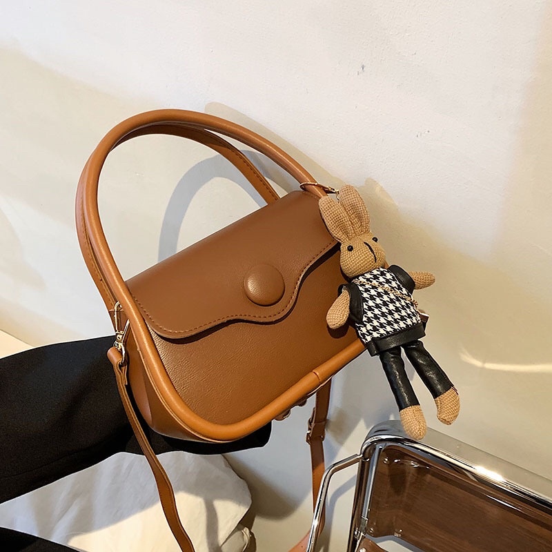Túi quai xách kèm gấu xinh
