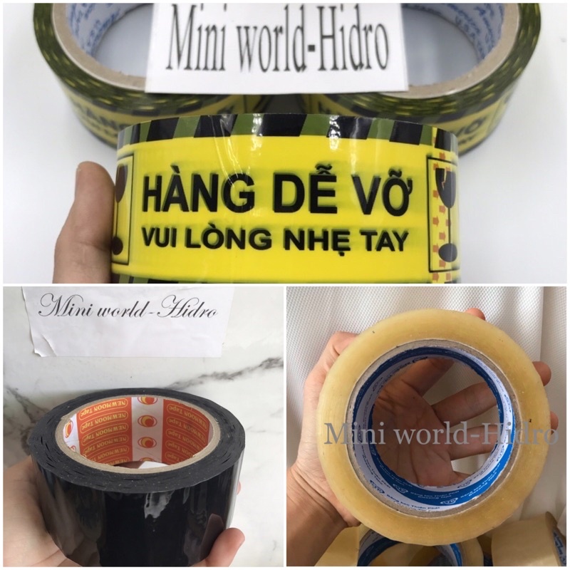 Băng keo trong dán hàng loại 1, keo dày, lõi giấy mỏng dễ bể vỡ màu đen