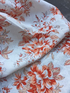 Vải linen bột hoa mẫu đơn màu cam đất.
