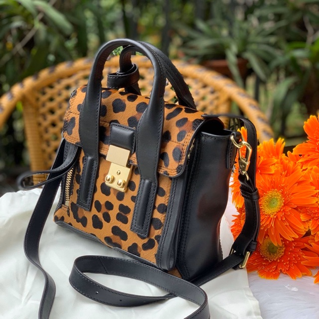 Túi Phillip Lim Pashli màu da báo leopard phủ lông