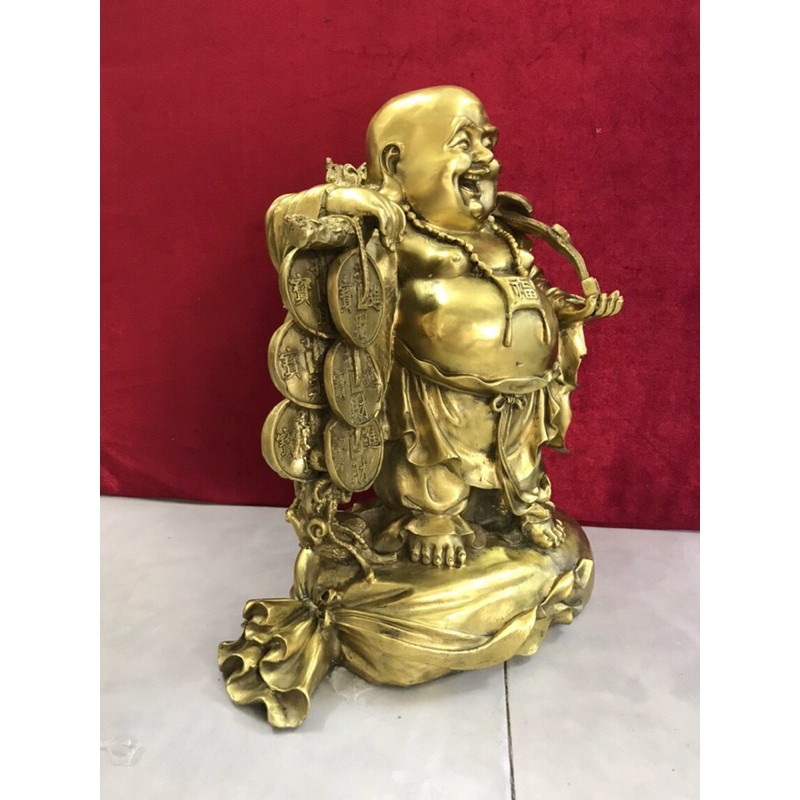 Di Lặc gánh tiền đứng trên bị