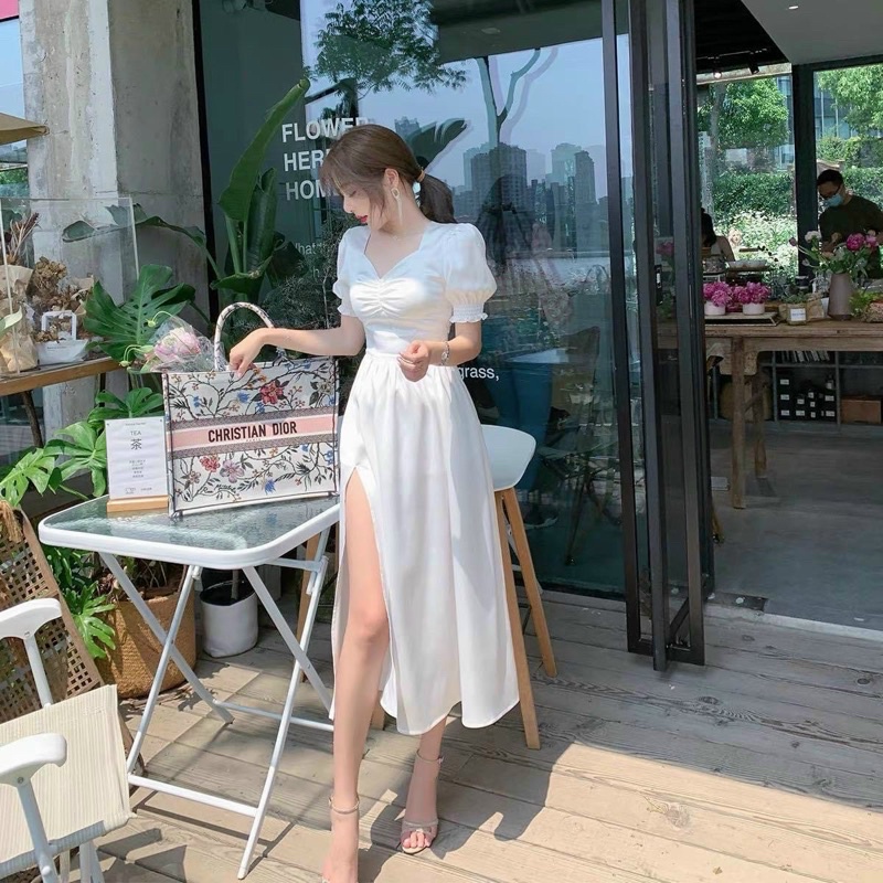 Đầm midi xoè trắng nhúng ngực xẻ tà váy đi tiệc