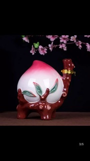 Bình gốm đào tiên đựng rượu
