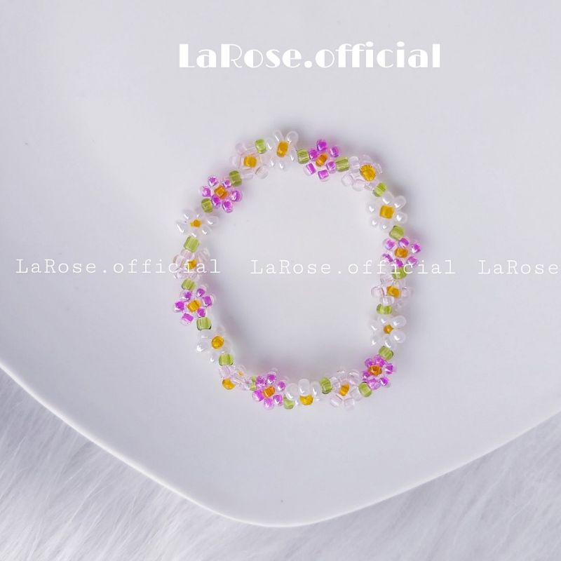 Vòng tay hoa thanh anh tone tím nhẹ