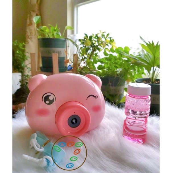 Máy ảnh thổi bong bóng xà phòng hình heo