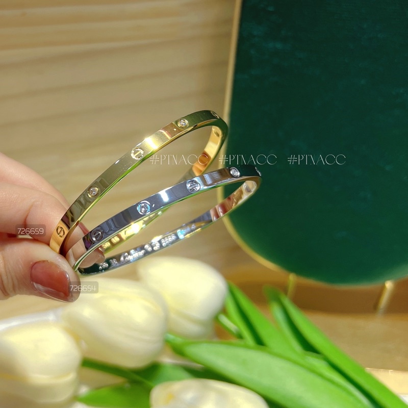 Vòng tay titan thương hiệu dáng mảnh cá tính đơn giản, dùng hằng ngày ko đen ko bay màu .PTNACC.
