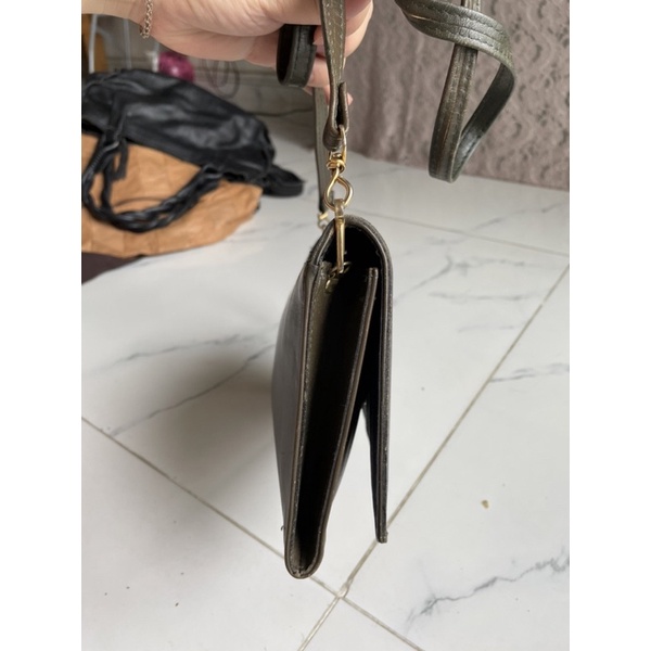 Ví cầm tay si của Pháp da mộc Ted Lapidus Paris