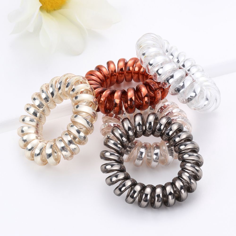 Dây buộc tóc nhựa kiểu dây lò xo màu trong suốt