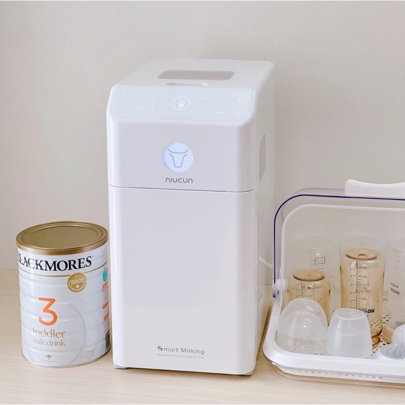 Máy pha sữa NIUCUN PRO có tiệt trùng UV thông minh, sấy khô, pha được tất cả các loai sữa từ 35-70đ