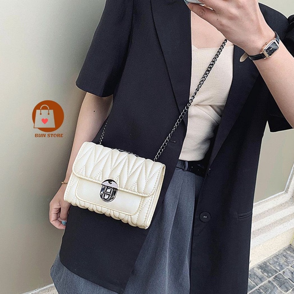 Túi xách nữ đeo chéo khóa xoay siêu sang