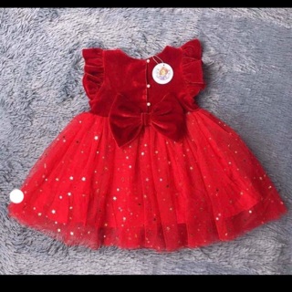 Váy đỏ nơ chân váy ngôi sao