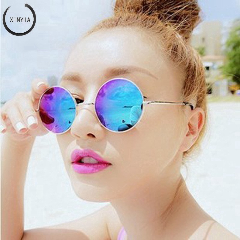 Kính mát gọng oval phong cách retro vintage