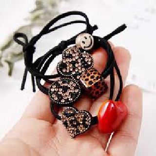 Cột tóc tròn đính đá sang trọng