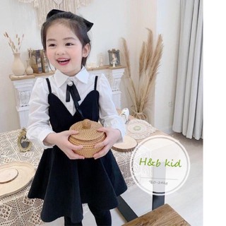 Xả váy đen trắng đính nơ bé gái,