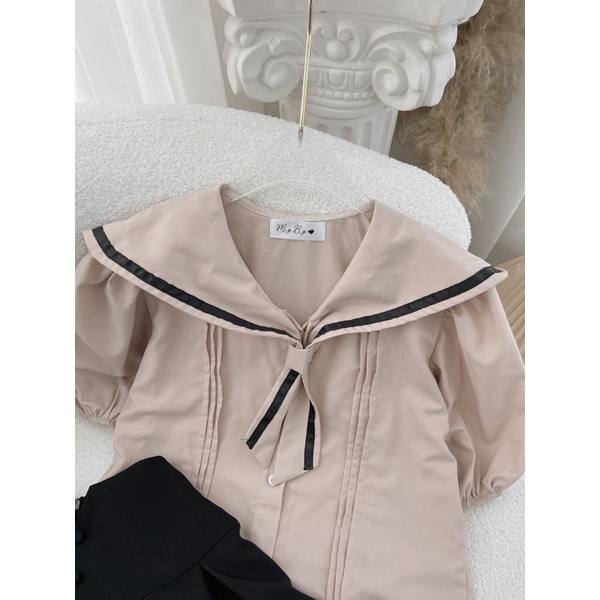 Set áo nâu cổ thùy thủ viền đen kèm chân váy xòe đen viền trắng