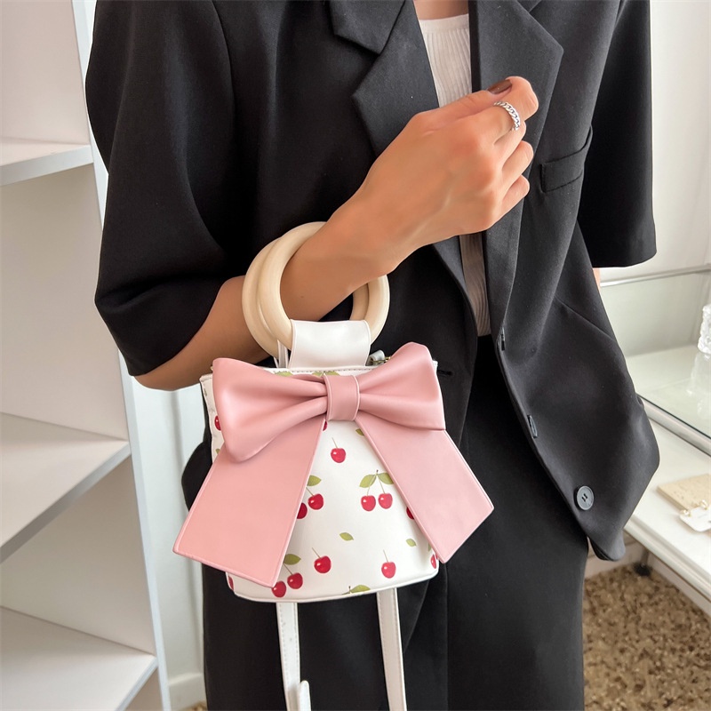 IELGY women's vintage print bow messenger bag