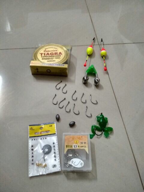 Combo cần câu 2 khúc shimano đặc 2,4m và máy câu yumoshi 6000. Tặng kèm phụ kiện