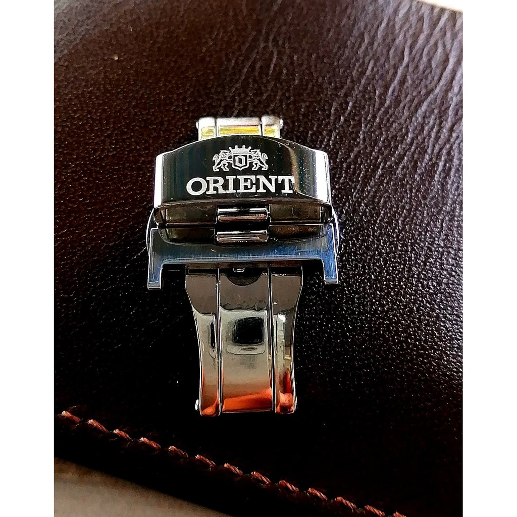 Khóa bướm khắc logo Orient