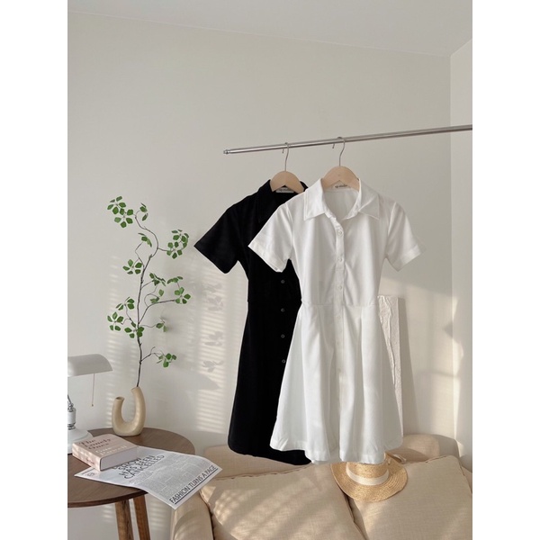 Váy body cổ polo khoét lưng thắt nơ sau phong cách trẻ trung