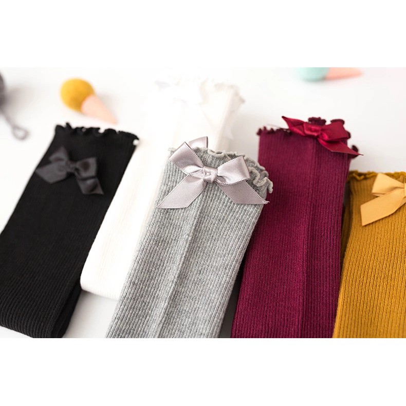 Đôi vớ cotton dáng dài trang trí nơ xinh xắn cho bé gái 1-8 tuổi