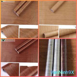 10 m giấy dán tường giả gỗ vàng gụ nâu đất đậm keo sẵn khổ 45 cm