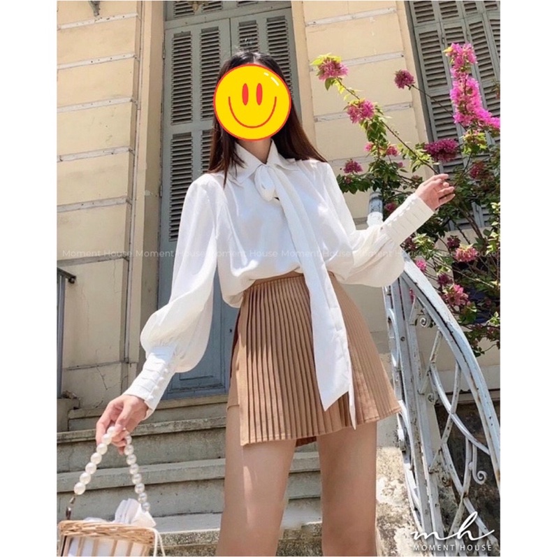 Chân váy xếp li xẻ tà dáng ngắn
