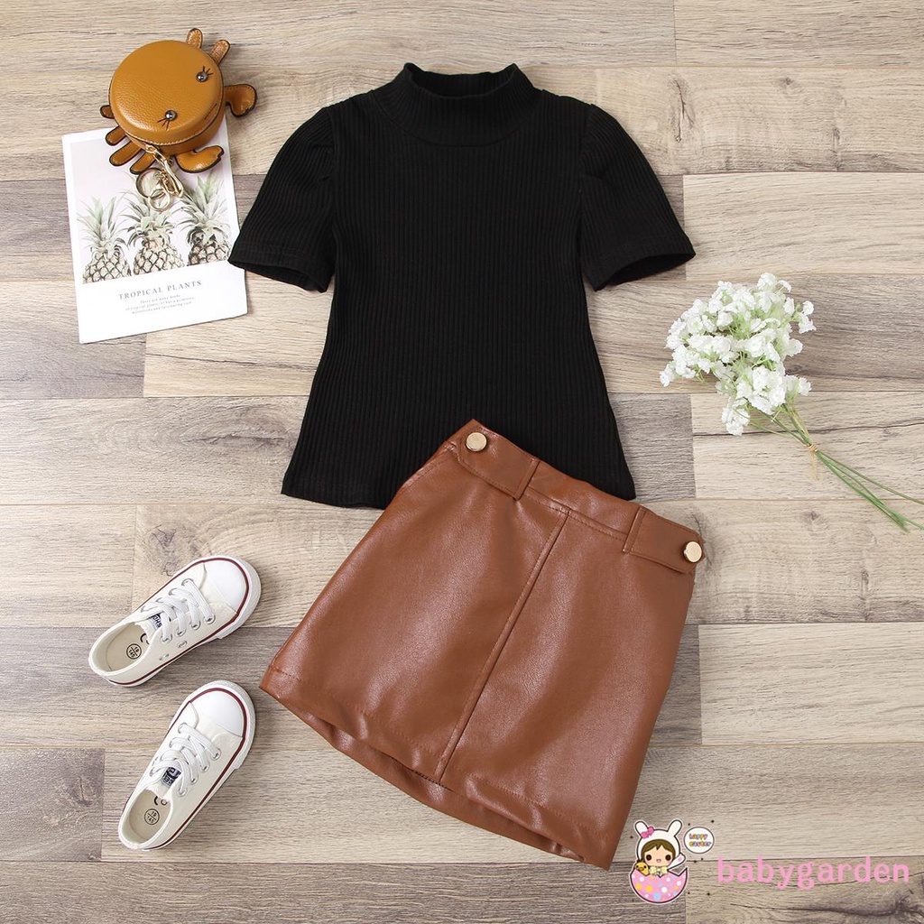 Bộ Áo Thun Cổ Cao Ngắn Tay + Chân Váy Mini Cho Bé Gái