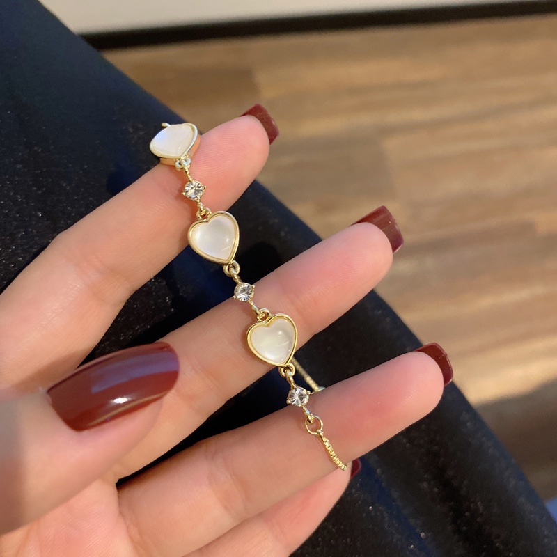 Korean fashion simple cat's eye heart shaped metal bracelet for women