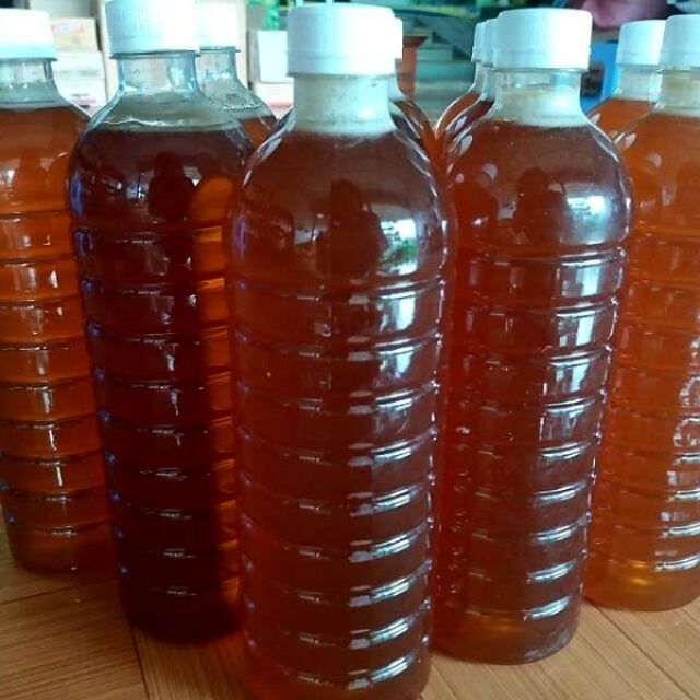 Mật ong Daklak chai 1 lít đặc sánh bao test ( ong ăn hoa tự nhiên )