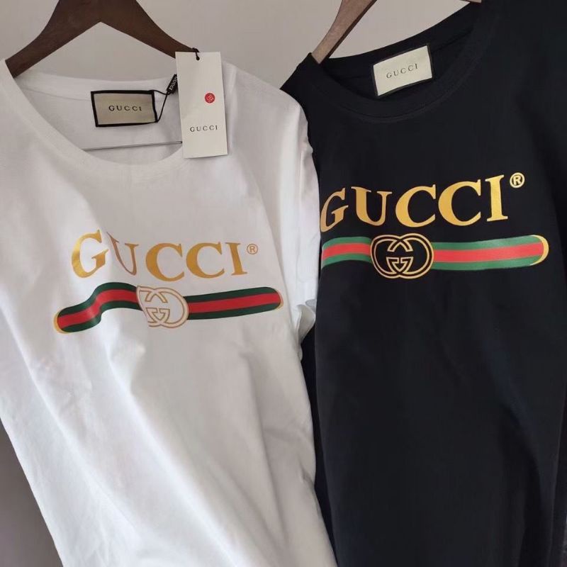 áo thun tay lỡ phông rộng in hình chữ gucci.