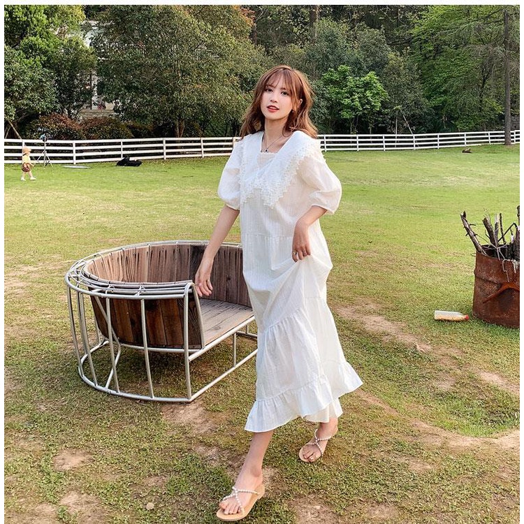 Đầm dáng rộng màu trắng dài hơn đầu gối thời trang cho nữ