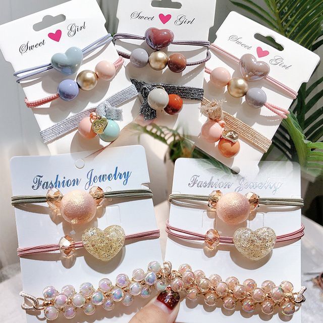 SET 3 CÁI CỘT TÓC VÒNG TAY HẠT ĐÁ TRONG SANG CHẢNH