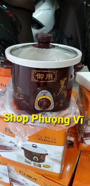 nồi hầm hoặc kho thịt cá tiện ích lõi bằng sứ loại 1.5l có 2 màu xanh và nâu.