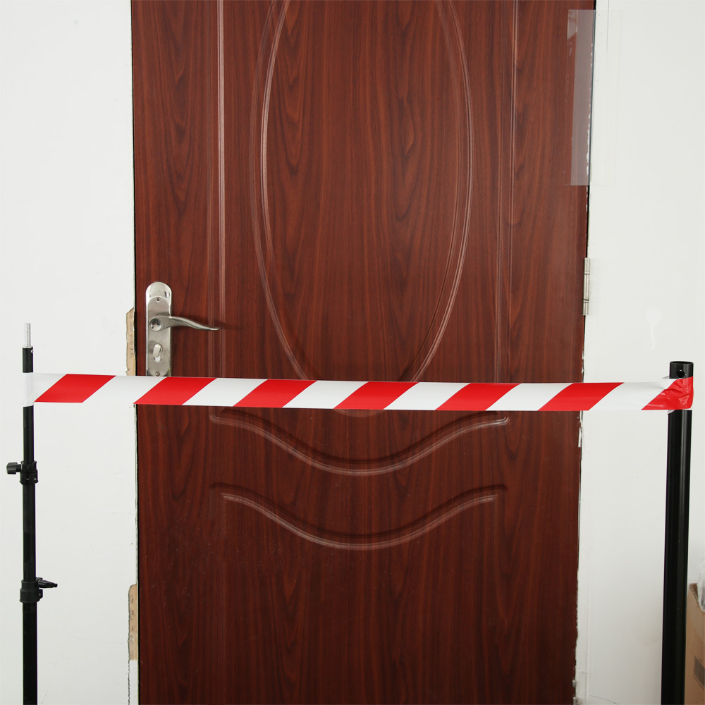 Cuộn băng keo tự dính đánh dấu cảnh báo sự nguy hiểm trên đường màu đen và vàng