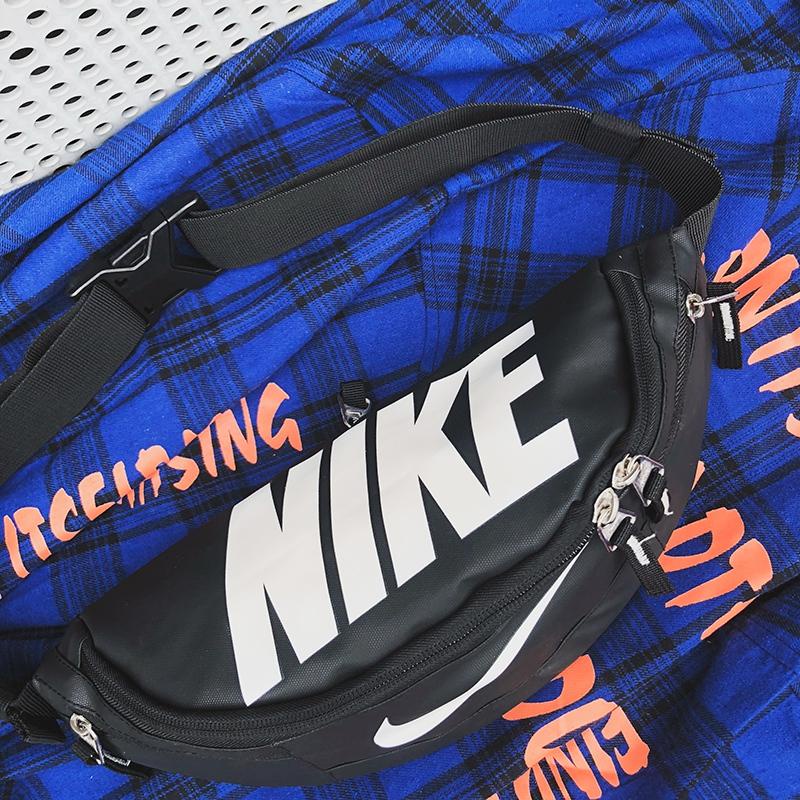 NIKE Black blue sling bag thin shoulder strap waist bag, large letter waist sling, two-way zipper men's bag, women's bag, school