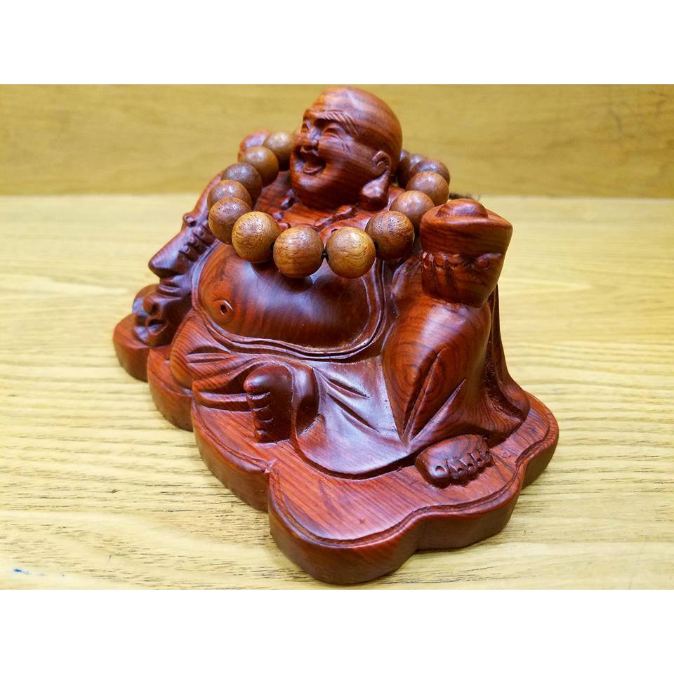 Tượng phật di lặc để ô tô gỗ hương