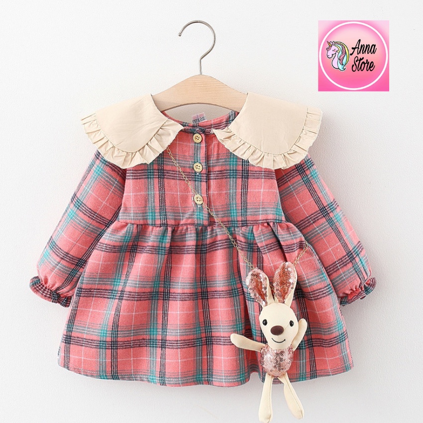 Set Đầm Bé Gái Caro Đỏ Dài Tay Phom Baby Doll Phối Túi Thỏ