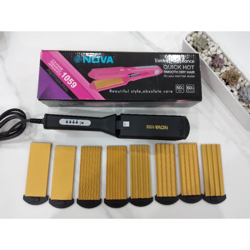 Máy làm tóc Guangming  8 lưỡi MS 1056