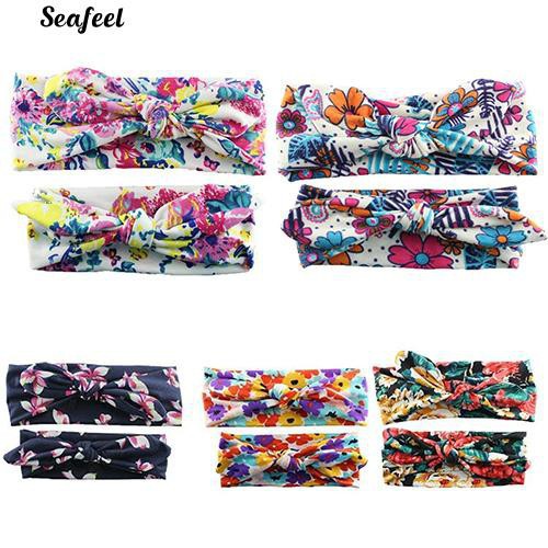 Set 2 băng đô nơ cho mẹ và bé.
