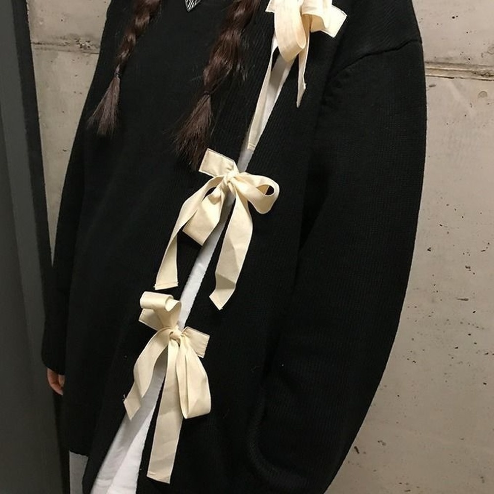 Áo Sweater dáng rộng màu đen đính nơ phong cách Hàn Quốc thời trang xuân thu