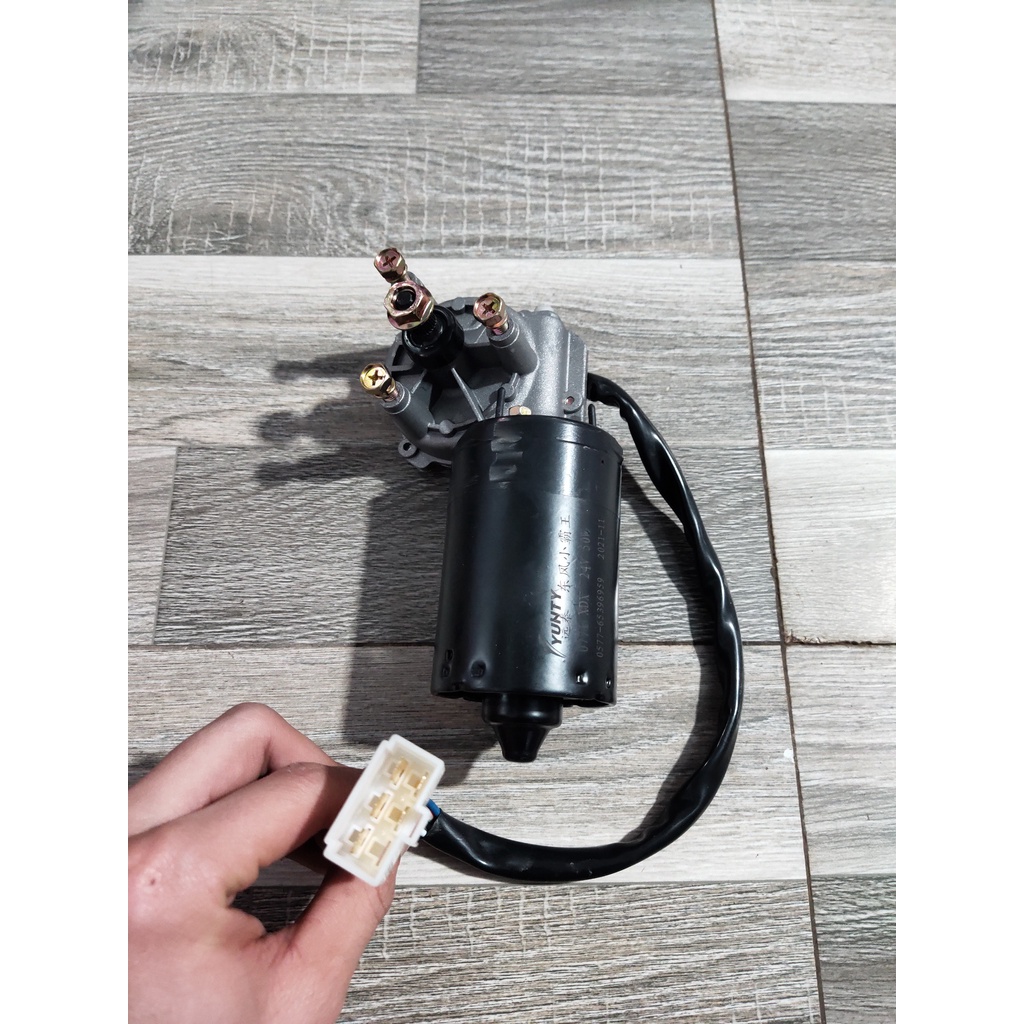 Sản phẩm gia đình làm:  Mô tơ gạt mưa 12v 24v chân hẹp mặt trái hộp xanh