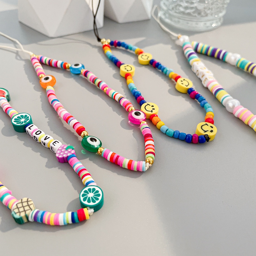 Dây Đeo Điện Thoại Chuỗi Hạt Ngọc Trai Nhiều Màu Hình Mặt Cười Mắt Quỷ