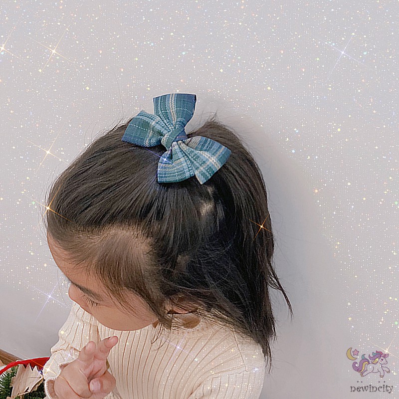 Kẹp tóc đính nơ kẻ sọc ca rô xinh xắn dành cho bé gái