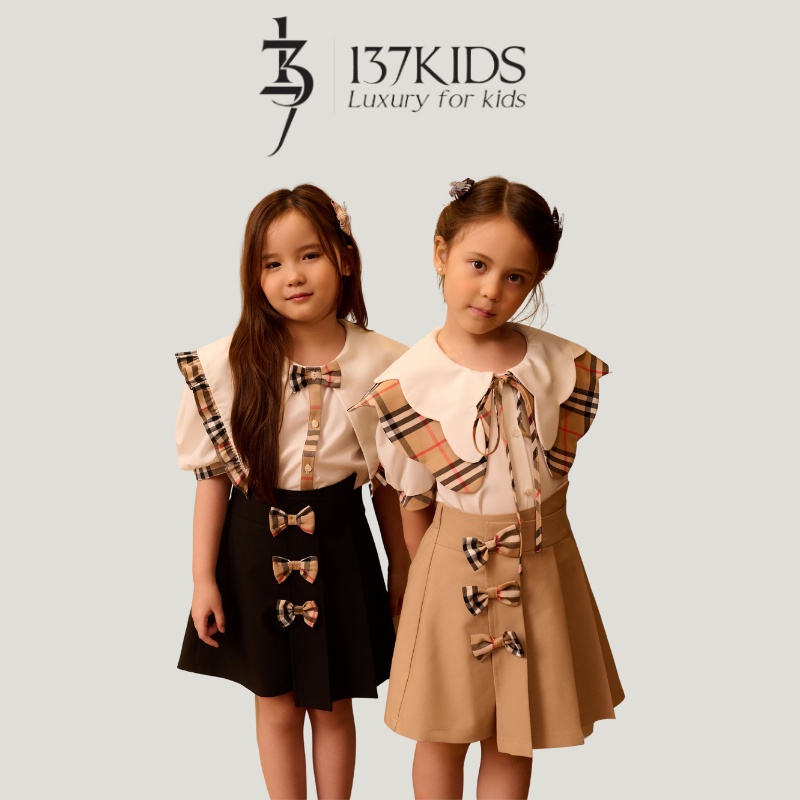 Chân váy xếp ly dáng A bé gái 137Kids thiết kế kèm nơ dễ thương cạp chun co giãn