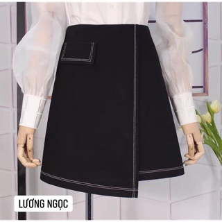 Chân váy chữ A có vạt trẻ trung dài trên gối