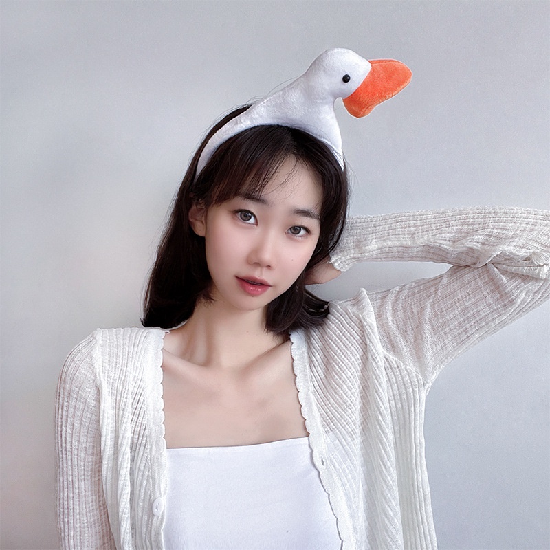 Băng đô cài tóc hình chú vịt dễ thương cho nữ