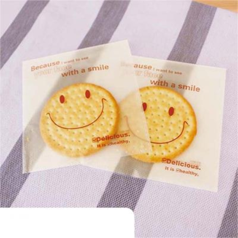Set 100 Túi Nhựa Đựng Bánh Kẹo In Hình Mặt Cười Xinh Xắn