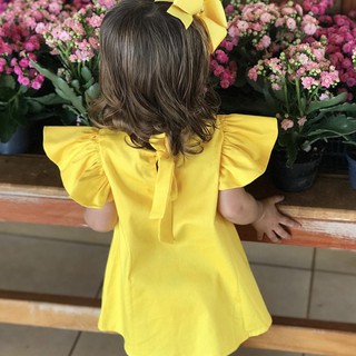Đầm bé gái thắt nơ eo