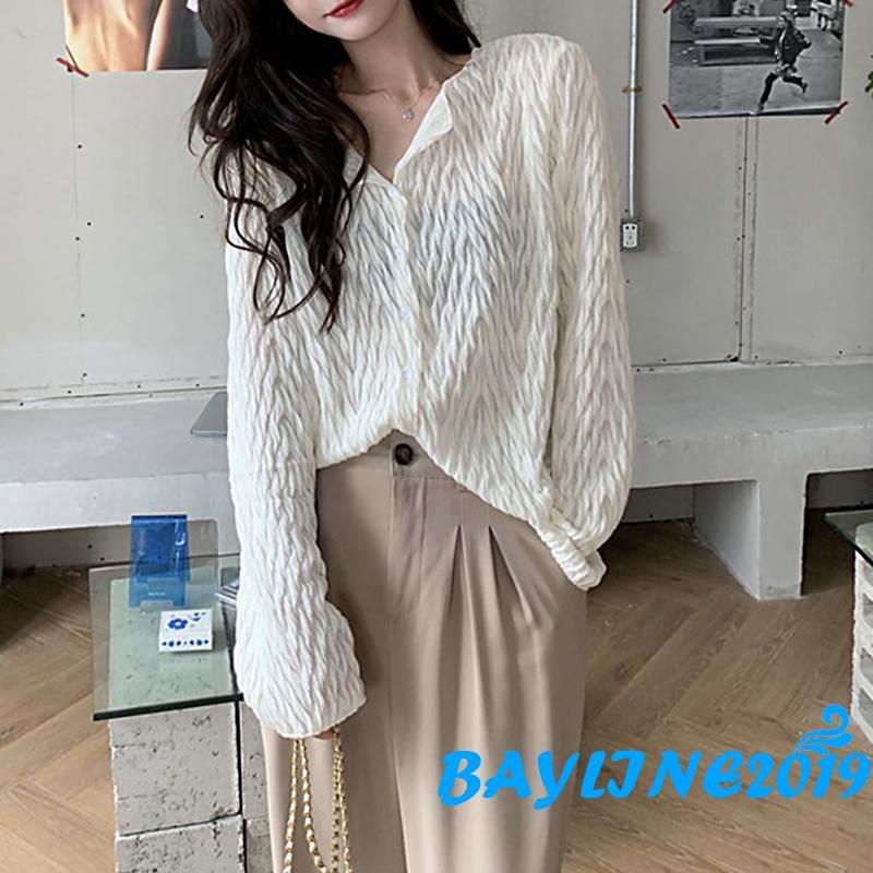 Áo kiểu tay dài cổ chữ V cài nút màu trơn dáng rộng màu be/kaki cho nữ