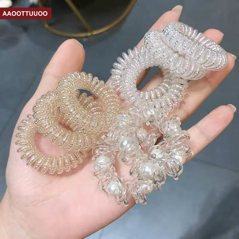 Dây cột tóc kiểu lò xo co giãn màu trong suốt đơn giản thời trang cho nữ
